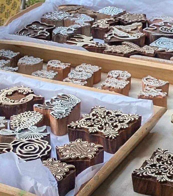 Hand-carved wooden printing blocks laid out for a block printing workshop